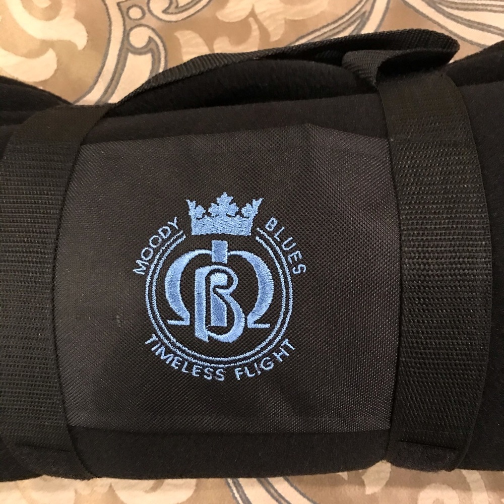 Moody Blues soft  fleece black throw. NWOT.